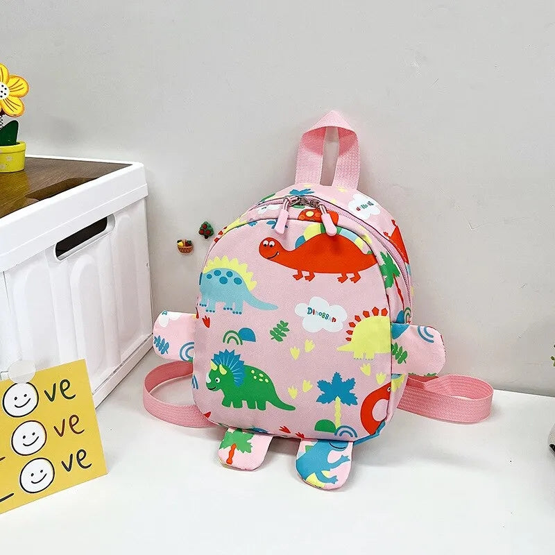 Mochila 🎒 Infantil para Niños de Dinosaurios Rosada